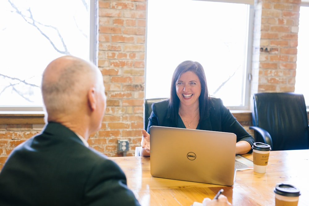 Business owner and consultant discussing a problem